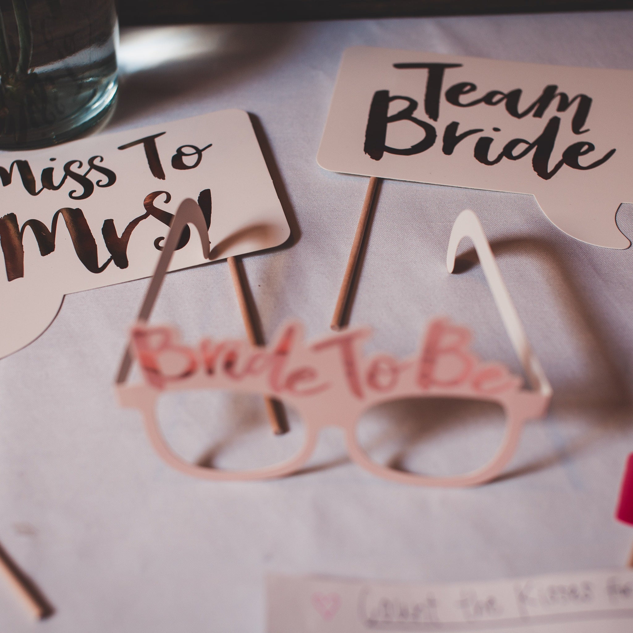 A table with bridal shower decor