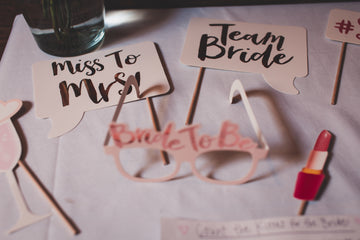 A table with bridal shower decor