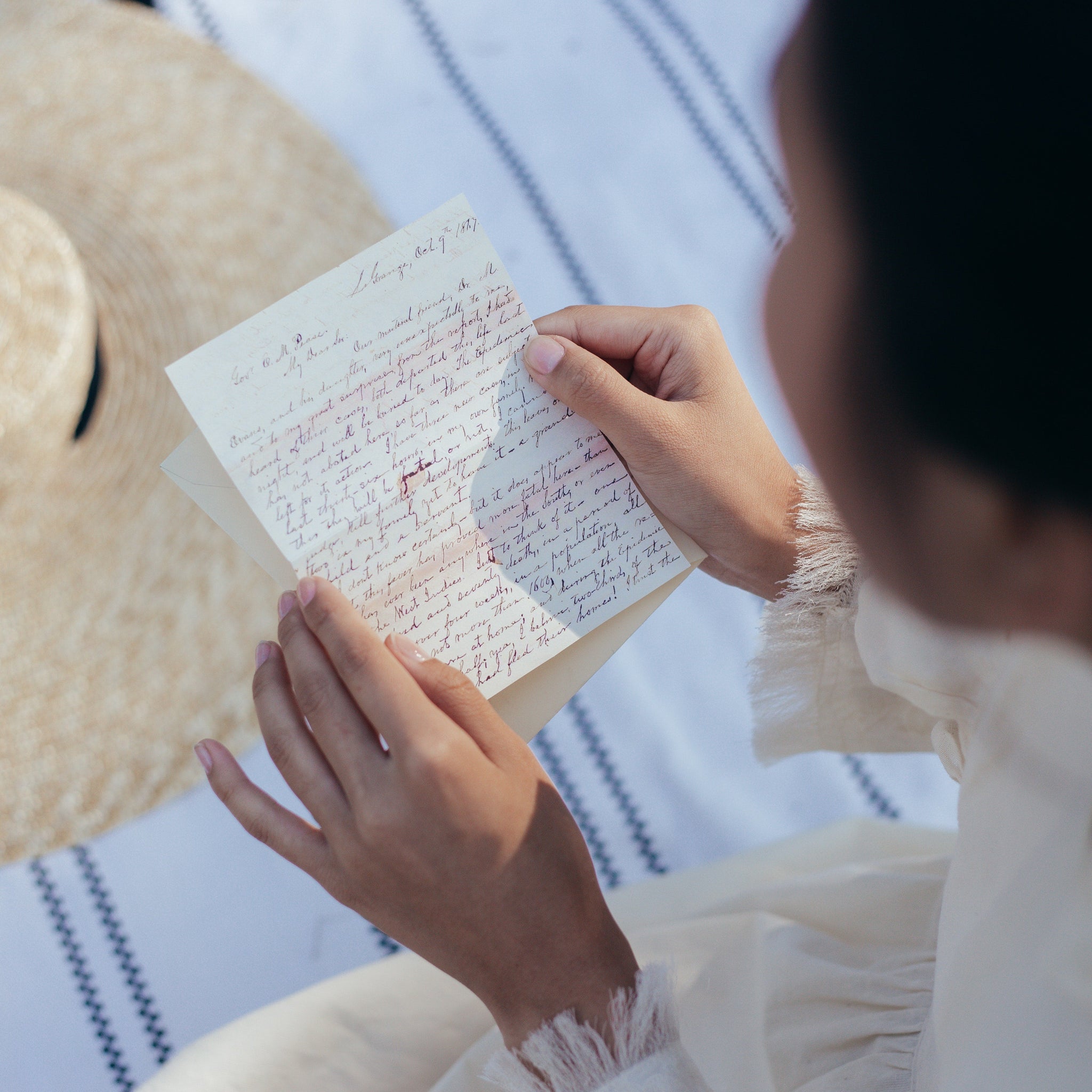 Overhead View of Woman Reading Letter