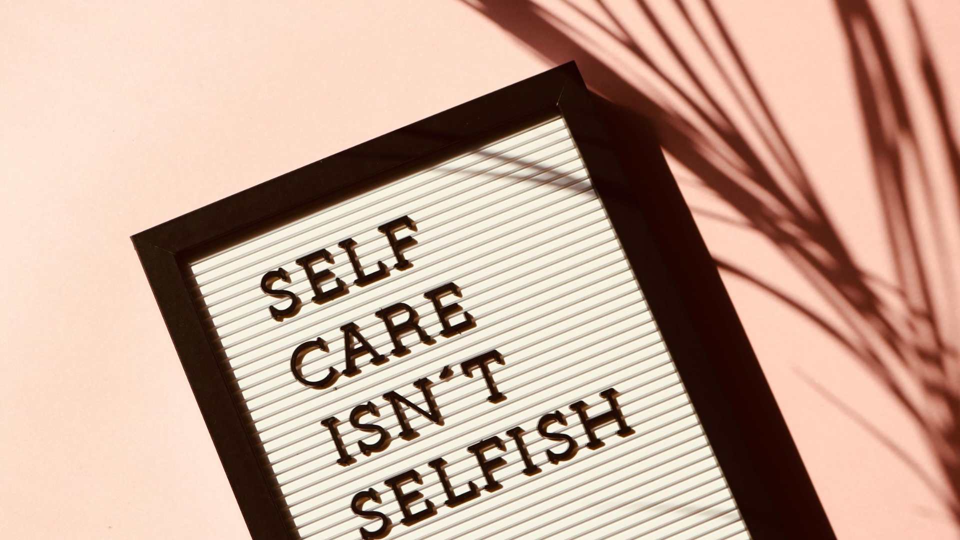 Free Self Care Isn't Selfish Signage Stock Photo