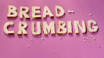 Breadcrumbing written in bread