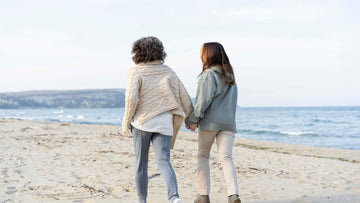 A couple of women standing next to each other