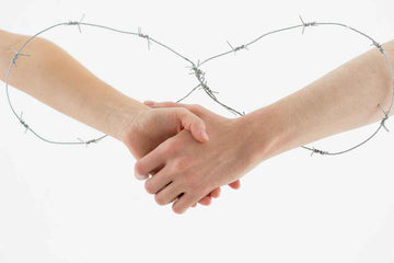 Two People Shaking Hands