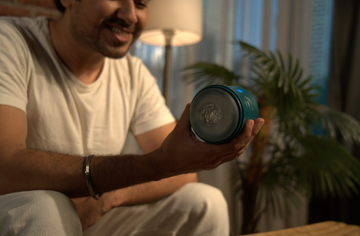 A man holding MyMuse’s Edge stroker