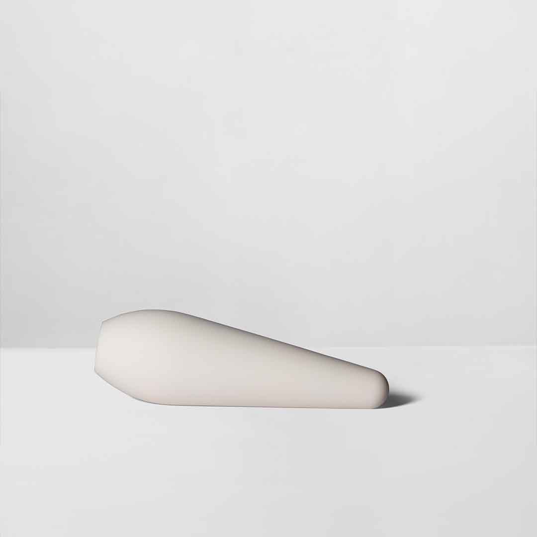 Front view of Pulse – a full body massager by MyMuse lying flat on the floor against a white background