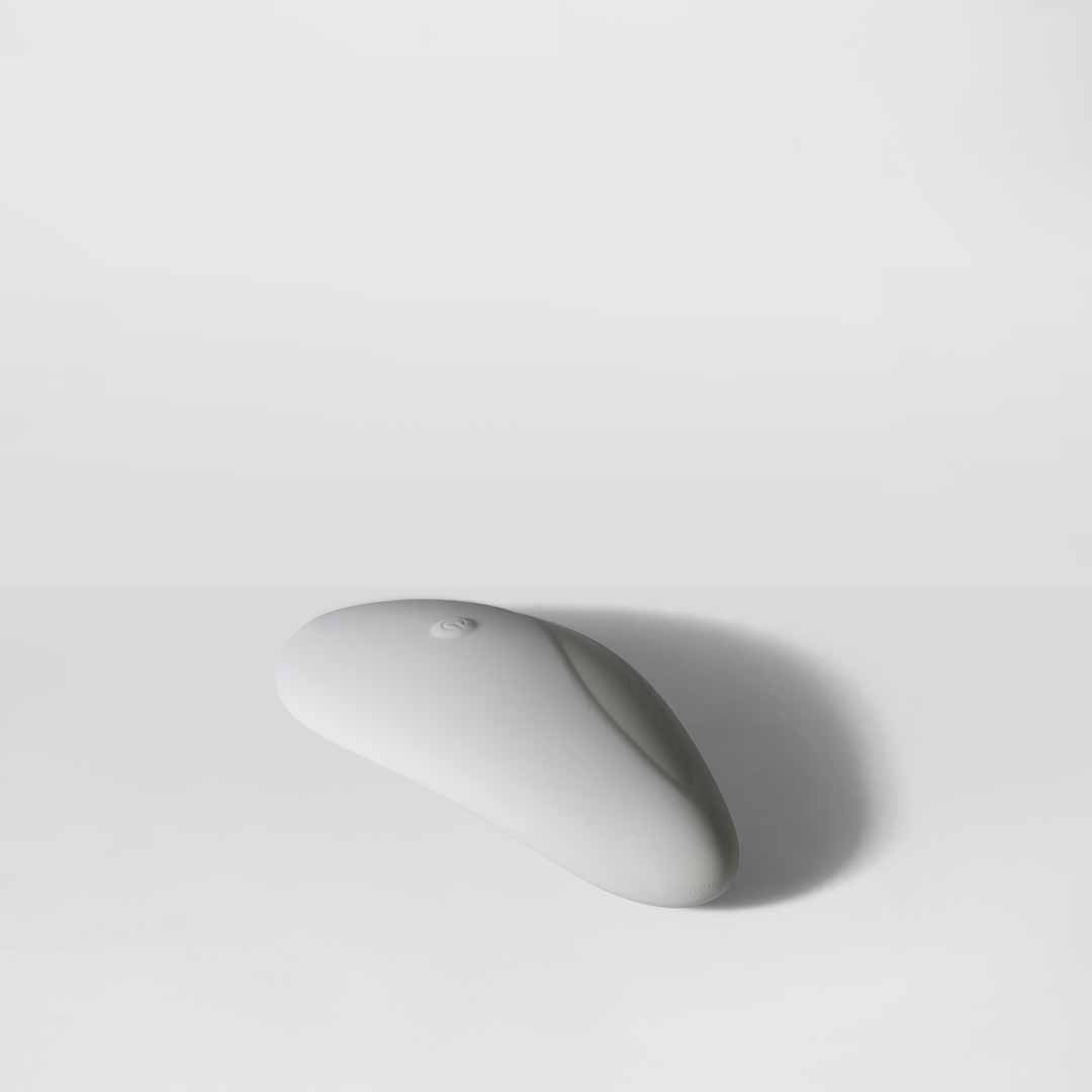 MyMuse's Brushed Suede Palm Massager laying on a white background