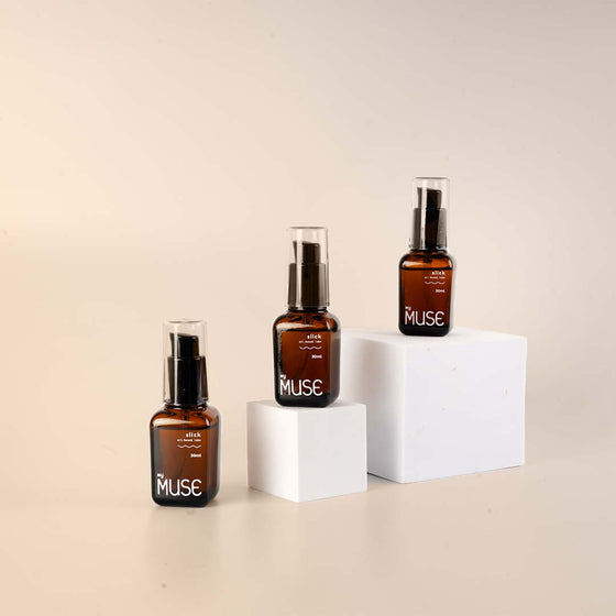 A picture of 3 bottle of slick; an oil based lubricant 